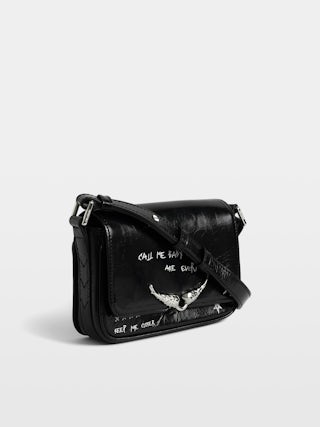 Le Zazi Vintage Graffiti Bag - Small patent leather bag with vintage effect and graffiti print, with adjustable strap and signature wings.