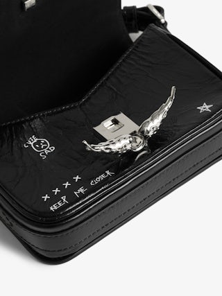 Le Zazi Vintage Graffiti Bag - Small patent leather bag with vintage effect and graffiti print, with adjustable strap and signature wings.