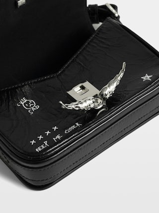 Le Zazi Vintage Graffiti Bag - Small patent leather bag with vintage effect and graffiti print, with adjustable strap and signature wings.