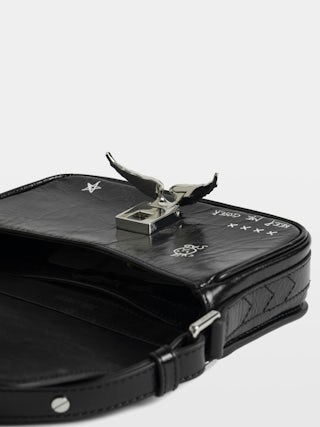 Le Zazi Vintage Graffiti Bag - Small patent leather bag with vintage effect and graffiti print, with adjustable strap and signature wings.