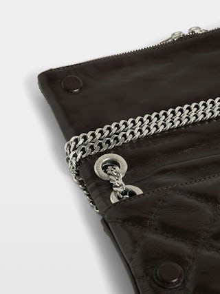 Rock II Vintage Monogram Clutch - Clutch in vintage quilted effect leather with sliding metal chain and signature wings.