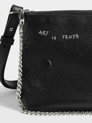 Rocky II Graffiti Bag - Grained leather bag with graffiti print and shoulder strap, featuring chain and signature wings adorned with rhinestones.