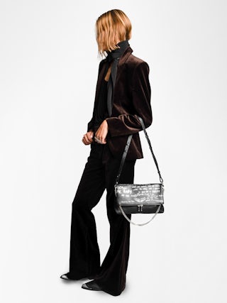 Sac Rocky II Graffiti - Sac en cuir grainé imprimé graffiti à bandoulière, avec chaine et ailes signatures ornées de strass.