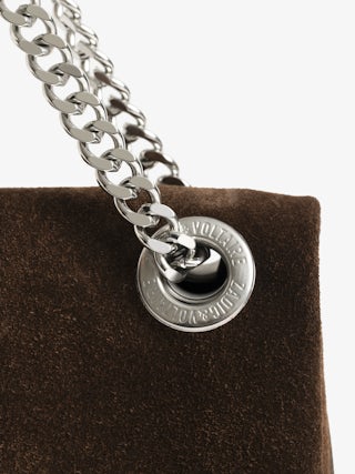 Rock II Suede Clutch - Suede leather clutch with sliding metal chain and signature wings.