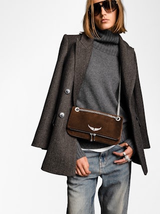 Rock II Suede Clutch - Suede leather clutch with sliding metal chain and signature wings.