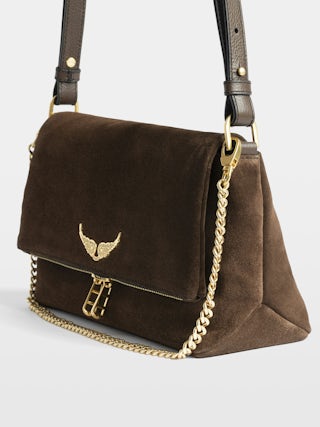 Sac Rocky II Suede - Sac en cuir suédé à bandoulière, avec chaine et ailes signatures ornées de strass.