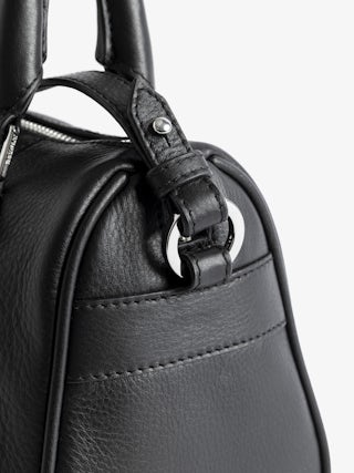 Sunny XS Vibe Bag - Grained leather bag, adjustable shoulder strap and handles with metal wings signature.