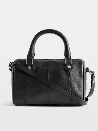 Sunny XS Vibe Bag - Grained leather bag, adjustable shoulder strap and handles with metal wings signature.