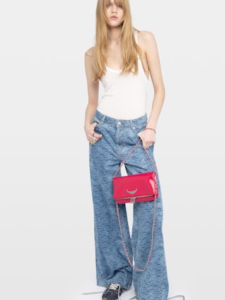 Clutch Rock Vintage Patent - Clutch in vintage-effect patent leather with two leather-and-metal chains and rhinestone wing signature.