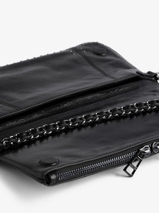 Rock Vintage Patent Studs Clutch - Clutch in patent leather with vintage effect featuring double leather and metal chains adorned with studs and rhinestone wings.