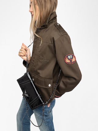 Rock Vintage Patent Studs Clutch - Clutch in patent leather with vintage effect featuring double leather and metal chains adorned with studs and rhinestone wings.