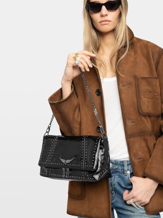 Rocky II Vintage Patent Studs Bag - Vintage patent leather bag with studs and shoulder strap, featuring signature chain and rhinestone-embellished wings.