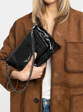 Rocky II Vintage Patent Studs Bag - Vintage patent leather bag with studs and shoulder strap, featuring signature chain and rhinestone-embellished wings.