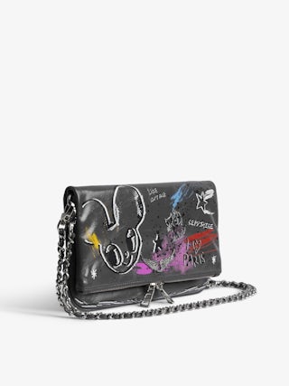 Rock Humberto Clutch - Grained leather clutch with Humberto Cruz customisation, featuring double leather and metal chains and rhinestone-embellished wings.