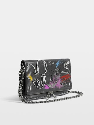 Rock Humberto Clutch - Grained leather clutch with Humberto Cruz customisation, featuring double leather and metal chains and rhinestone-embellished wings.