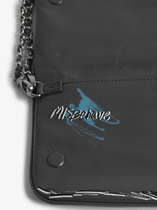 Rock Humberto Clutch - Grained leather clutch with Humberto Cruz customisation, featuring double leather and metal chains and rhinestone-embellished wings.