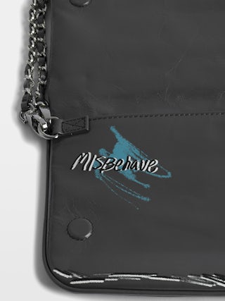 Rock Humberto Clutch - Grained leather clutch with Humberto Cruz customisation, featuring double leather and metal chains and rhinestone-embellished wings.