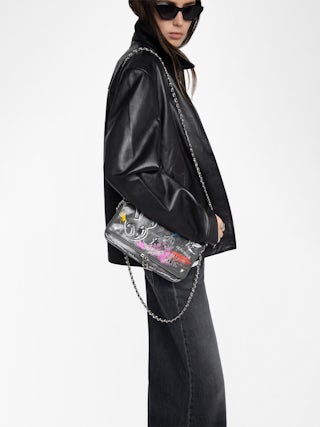 Rock Humberto Clutch - Grained leather clutch with Humberto Cruz customisation, featuring double leather and metal chains and rhinestone-embellished wings.