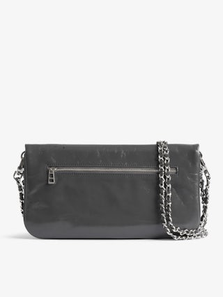 Rock Humberto Clutch - Grained leather clutch with Humberto Cruz customisation, featuring double leather and metal chains and rhinestone-embellished wings.