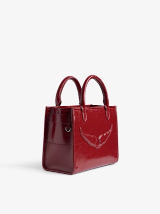 Sac Angel Tote XS - Petit sac en cuir froissé à doubles anses, bandoulière et signature ailes en relief.