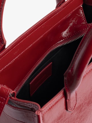 Sac Angel Tote XS - Petit sac en cuir froissé à doubles anses, bandoulière et signature ailes en relief.