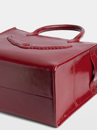 Angel Tote XS Bag - Small bag in crumpled leather with double handles, shoulder strap and embossed wings signature.