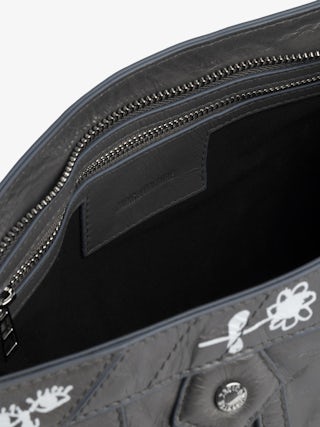 Sac Sunny Moody Humberto - Sac en cuir vernis effet vintage, à bandoulière ajustable et signature ailes et imprimés Humberto Cruz.