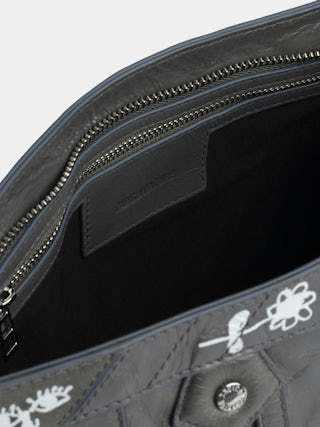 Sunny Moody Humberto Bag - Patent leather bag with vintage effect, with adjustable shoulder strap and wings signature and Humberto Cruz prints.