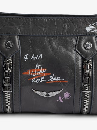 Sunny Mood Humberto Bag - Small patent leather bag with vintage effect, adjustable shoulder strap and wings signature with Humberto Cruz prints.