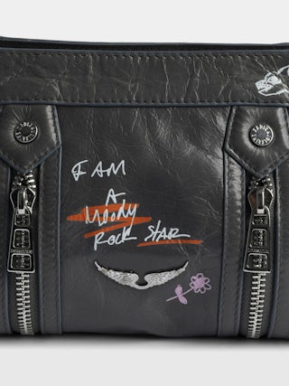 Sunny Mood Humberto Bag - Small patent leather bag with vintage effect, adjustable shoulder strap and wings signature with Humberto Cruz prints.