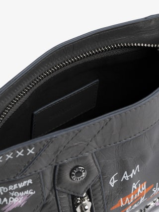 Sunny Mood Humberto Bag - Small patent leather bag with vintage effect, adjustable shoulder strap and wings signature with Humberto Cruz prints.