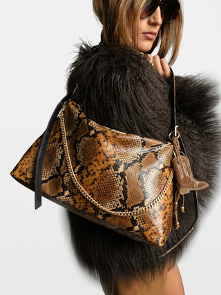 Jim Wild Bag - Soft python-effect leather bag adorned with a chain and rhinestone wing.