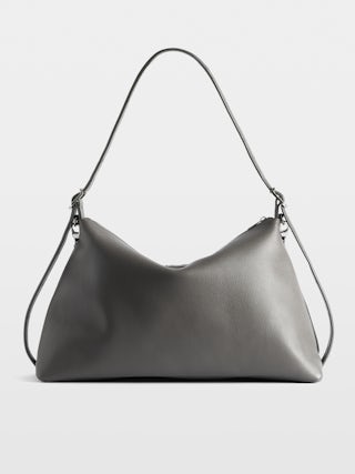 Borsa Jim - Borsa morbida in pelle martellata ornata con catena e ala con strass.