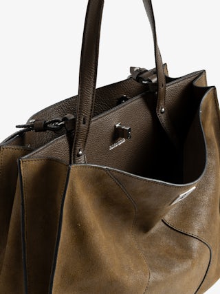 Jack Bag - Suede leather bag with signature clasp, featuring two compartments, one handle and adjustable strap.