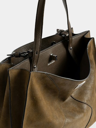 Jack Suede Bag - Suede leather bag with signature clasp, featuring two compartments, one handle and adjustable strap.