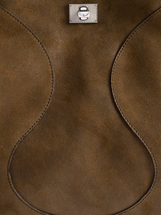 Jack Bag - Suede leather bag with signature clasp, featuring two compartments, one handle and adjustable strap.