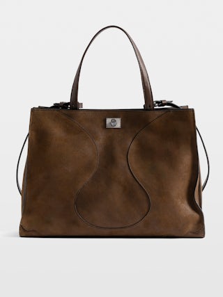 Jack Bag - Suede leather bag with signature clasp, featuring two compartments, one handle and adjustable strap.