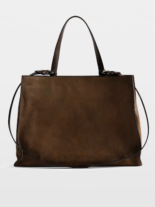 Jack Bag - Suede leather bag with signature clasp, featuring two compartments, one handle and adjustable strap.
