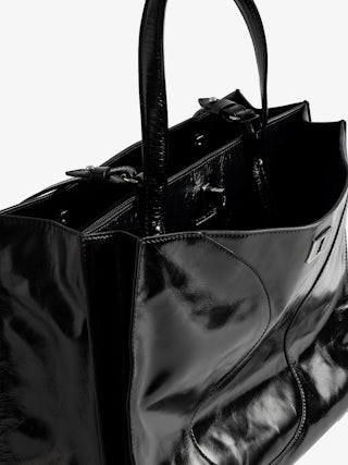 Jack Vintage Patent Bag - Vintage-effect leather bag adorned with a signature clasp, featuring two compartments, a handle and an adjustable strap.