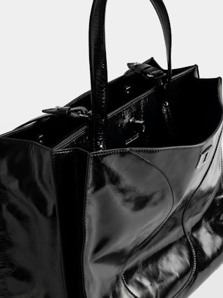 Jack Vintage Patent Bag - Vintage-effect leather bag adorned with a signature clasp, featuring two compartments, a handle and an adjustable strap.