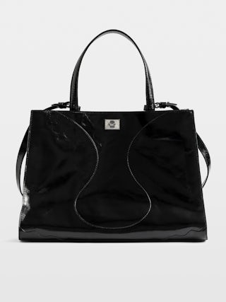Jack Vintage Patent Bag - Vintage-effect leather bag adorned with a signature clasp, featuring two compartments, a handle and an adjustable strap.