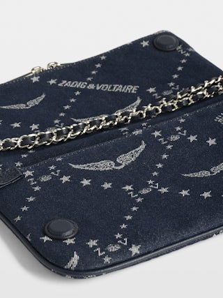 Clutch Rock Denim Monogram - Monogram jacquard with leather shoulder strap and chains voltaire signature embroidery.