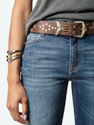 Ceinture Jane - Ceinture en cuir vintage orné de motifs gravés, clous et boucle ailes signatures.