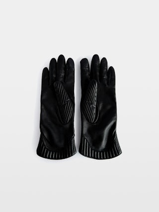 Out of Hands Gloves - Black smooth and quilted leather gloves from the Voltaire Vice collection, crafted in the workshops of the famous glove maker Agnelle.
