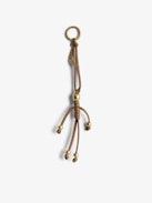 Charms Grigri Skull - Smooth leather grigri charm in the shape of a skeleton to hang on a bag, for example.