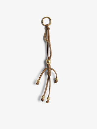 Skull Keyring - Smooth leather grigri charm in the shape of a skeleton to hang on a bag, for example.