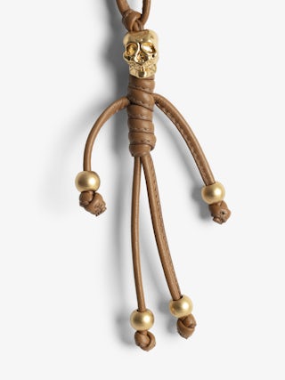 Skull Keyring - Smooth leather grigri charm in the shape of a skeleton to hang on a bag, for example.