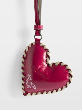 Porte-Clés Heart Tag - Grigri en cuir vintage, contour tressé et signature ailes.