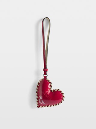 Porte-Clés Heart Tag - Grigri en cuir vintage, contour tressé et signature ailes.