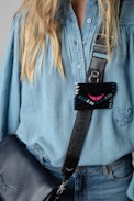 Enveloppe Clutch - Enveloppe clutch in blue leopard-print suede with coloured embroidery